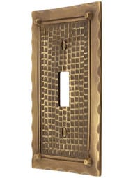 Bungalow Style Single Toggle Switch Plate In Antique Brass.